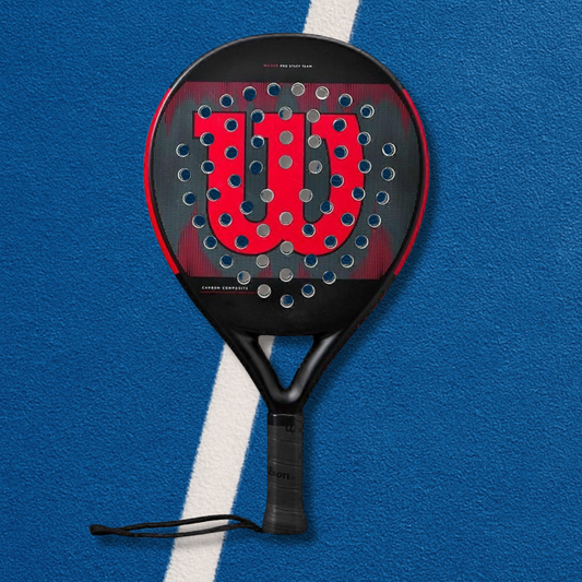 Wilson tennis racket on a blue background
